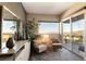 Sitting area in the main bedroom featuring natural light and mountain views at 5436 Succulent Rose Dr, Las Vegas, NV 89135