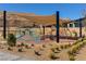Modern playground with climbing structures and sunshade, designed for active play and community enjoyment at 5436 Succulent Rose Dr, Las Vegas, NV 89135