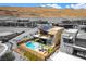 Modern home featuring a backyard oasis with a pool, spa, patio area, and desert landscaping at 5436 Succulent Rose Dr, Las Vegas, NV 89135