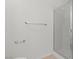Neutral bathroom with a glass shower door and stainless steel towel rack at 5655 E Sahara Ave # 2044, Las Vegas, NV 89142