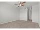 Large bedroom features carpeted floors, ceiling fan, and light walls at 5655 E Sahara Ave # 2044, Las Vegas, NV 89142