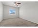 Large, bright bedroom features carpeted floors and a lighted ceiling fan at 5655 E Sahara Ave # 2044, Las Vegas, NV 89142