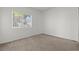 Neutral bedroom offers carpeted floors and light walls at 5655 E Sahara Ave # 2044, Las Vegas, NV 89142