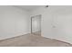 Neutral bedroom offers carpeted floors, closet with mirrored doors, and light walls at 5655 E Sahara Ave # 2044, Las Vegas, NV 89142