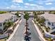 Aerial view showcasing the Terrasanta Condominiums entrance, manicured landscaping, and inviting community layout at 5655 E Sahara Ave # 2044, Las Vegas, NV 89142