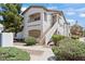 Well-maintained condominium with lush landscaping, covered entry, and private balcony, showcasing inviting curb appeal at 5655 E Sahara Ave # 2044, Las Vegas, NV 89142