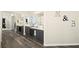 Modern bathroom featuring dual sinks, a large mirror, and ample storage space at 5832 Ivy Vine Ct, Las Vegas, NV 89141