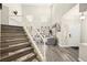 Grand entryway showcasing a staircase, open living area, and front door at 5832 Ivy Vine Ct, Las Vegas, NV 89141