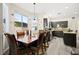 Eat-in kitchen with a view features dark cabinetry and stainless steel appliances at 5832 Ivy Vine Ct, Las Vegas, NV 89141