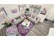 Cozy sitting area with plush sofas, decorative accents, and natural light at 5832 Ivy Vine Ct, Las Vegas, NV 89141