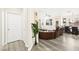 Open-concept living area featuring hardwood floors and neutral decor at 5832 Ivy Vine Ct, Las Vegas, NV 89141