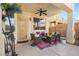 Outdoor patio area featuring a ceiling fan and ample seating for outdoor entertaining at 5832 Ivy Vine Ct, Las Vegas, NV 89141