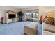 Cozy living room featuring a sliding door that showcases a pristine backyard at 5921 Halifax Ave, Las Vegas, NV 89107