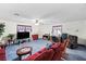 Expansive living room with comfortable red seating and plenty of natural light at 5921 Halifax Ave, Las Vegas, NV 89107
