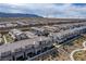 Community aerial view showcasing the orderly layout and uniform housing design at 6150 Foxes Dale St, Las Vegas, NV 89166