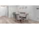 Elegant dining room with comfortable upholstered chairs and modern decor at 6150 Foxes Dale St, Las Vegas, NV 89166