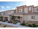 Desirable townhome with covered porch and easy-care desert landscaping at 6150 Foxes Dale St, Las Vegas, NV 89166