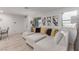 Comfortable living room featuring a large sectional sofa and modern decor at 6150 Foxes Dale St, Las Vegas, NV 89166