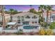 Backyard view of house with pool, spa and outdoor seating at 62 Incline Village Ct, Henderson, NV 89074
