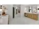 Spacious bathroom featuring dual vanities, black fixtures, and sleek design at 62 Incline Village Ct, Henderson, NV 89074
