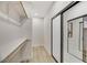Walk-in closet featuring custom shelving and ample storage space at 62 Incline Village Ct, Henderson, NV 89074