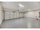 This bright garage has two doors, overhead lighting, and a clean epoxy floor, adding functionality and style at 62 Incline Village Ct, Henderson, NV 89074