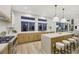 Bright kitchen boasts an expansive island, stainless steel appliances, and lots of natural light at 62 Incline Village Ct, Henderson, NV 89074