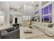 Large open living room features high ceilings, second level access, and views to the backyard at 62 Incline Village Ct, Henderson, NV 89074