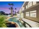 Enjoy a heated pool with a waterfall feature in a backyard made for entertaining and relaxation at 62 Incline Village Ct, Henderson, NV 89074