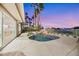 Enjoy a heated pool with a waterfall feature in a backyard made for entertaining and relaxation at 62 Incline Village Ct, Henderson, NV 89074