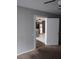 The interior view shows a glimpse into the kitchen with modern appliances at 621 Van Ert Ave, North Las Vegas, NV 89030