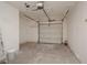 View of empty garage with attached overhead door at 6215 Don Zarembo Ave, Las Vegas, NV 89108
