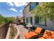 Enjoy lounging in the landscaped backyard with patio and outdoor dining area at 63 Via Di Mello, Henderson, NV 89011