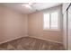Bedroom featuring neutral walls, carpeted floors, plantation shutters, and closet at 63 Via Di Mello, Henderson, NV 89011