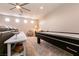 Loft area featuring a pool table, accent chairs, and carpeted floors at 63 Via Di Mello, Henderson, NV 89011