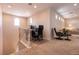 Upstairs loft area, featuring carpeted floors, computer desk, and comfortable seating area at 63 Via Di Mello, Henderson, NV 89011