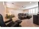 Upstairs loft area with seating, ceiling fan and plantation shutters for a light and airy feel at 63 Via Di Mello, Henderson, NV 89011