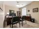 Comfortable office with dark wood desk and cabinets, carpet floors, and natural light at 63 Via Di Mello, Henderson, NV 89011