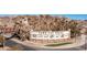 Entrance sign for Lake Las Vegas, highlighting the community's amenities and welcoming atmosphere at 63 Via Di Mello, Henderson, NV 89011