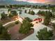 Wonderful home with mature trees, green spaces, large driveway, horse shoe entrance and mountain views at 6931 Leon Ave, Las Vegas, NV 89131