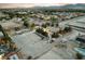 Expansive lot featuring horse property, an outdoor pool and a charming red home with white fencing at 6931 Leon Ave, Las Vegas, NV 89131