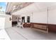 Cozy front porch features a swing and comfortable seating for relaxing outdoors at 6931 Leon Ave, Las Vegas, NV 89131