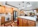 Open kitchen featuring stainless steel appliances and center island with white countertops at 6931 Leon Ave, Las Vegas, NV 89131