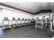Fully-equipped fitness center with treadmills and weight machines for residents at 7012 Bright Springs Ct, Las Vegas, NV 89113