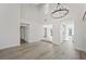 Living area featuring vaulted ceilings and an open floor plan at 7012 Bright Springs Ct, Las Vegas, NV 89113