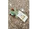 A thank you giftbox on a granite countertop with a card thanking the recipient for viewing the home at 7497 Alamo Ranch Ave, Las Vegas, NV 89179