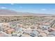 High aerial perspective of the community showcasing rows of single-Gathering homes and distant mountains at 7890 Aurora Sky St # 1, North Las Vegas, NV 89084