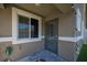 Cozy covered backyard patio and lush artificial turf in peaceful setting at 7890 Aurora Sky St # 1, North Las Vegas, NV 89084