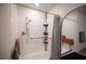 Bathroom features a spacious walk-in shower with safety bars and a convenient shower seat at 7890 Aurora Sky St # 1, North Las Vegas, NV 89084
