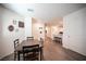 Cozy dining area adjacent to the kitchen, creating a seamless flow for easy entertaining and dining at 7890 Aurora Sky St # 1, North Las Vegas, NV 89084